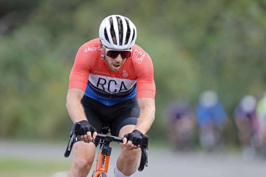 Cam Nicholls, riding with RCA jersey